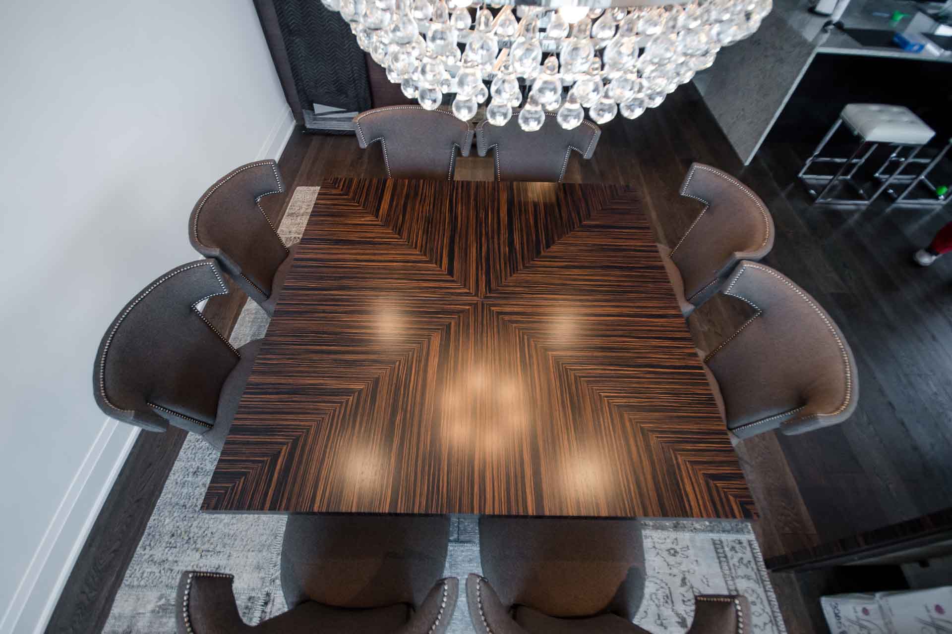 Dinning room table fabricated from zebrano veneer